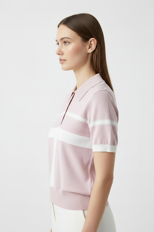 Model wearing pink polo - 3/4 angle