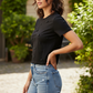 Black Pearl T-Shirt - Female Model Side Pose