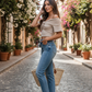 Beige Twist Knot Top - Female Model Side Pose