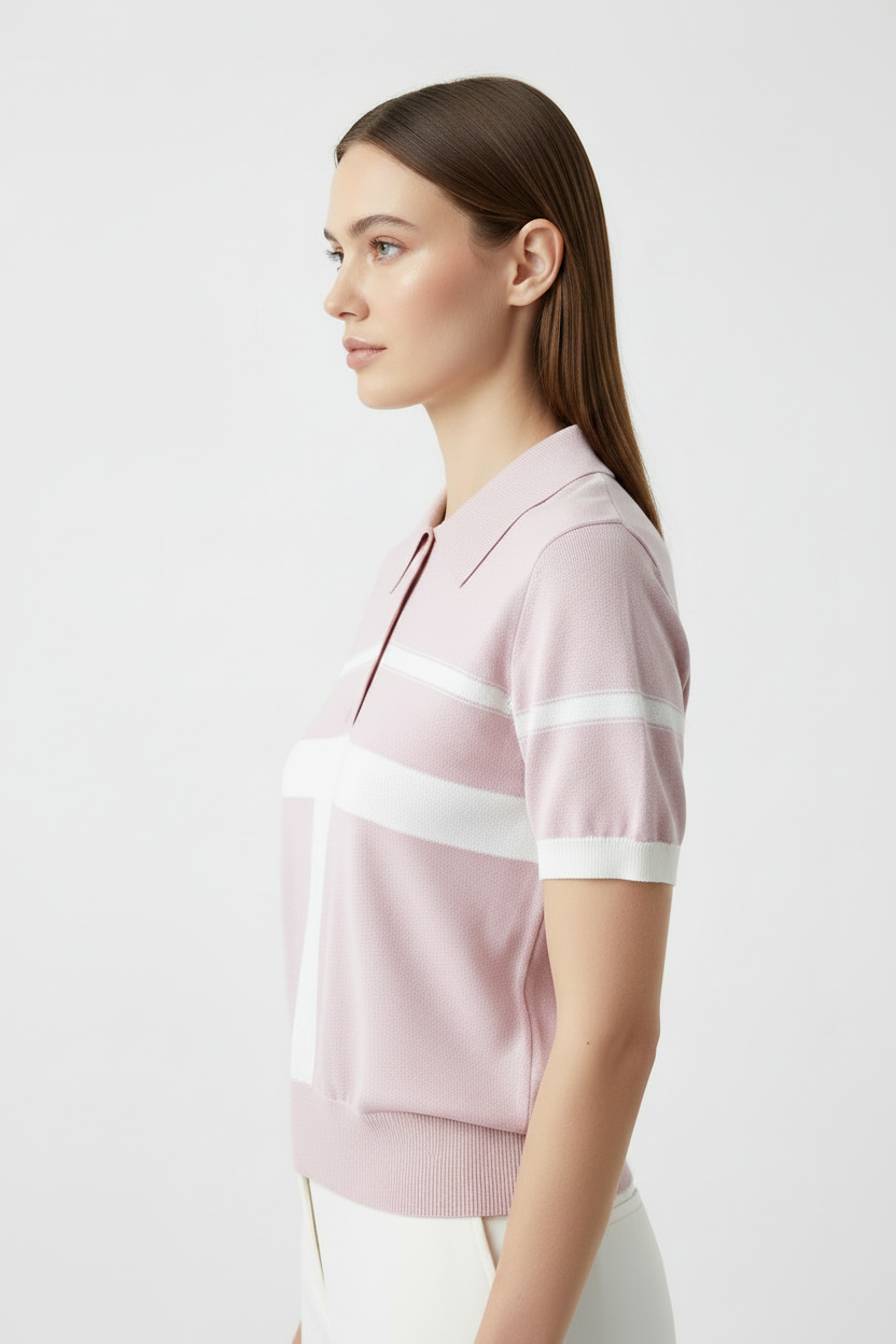 Model wearing pink polo - 3/4 angle