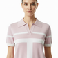 Model wearing pink polo - closeup